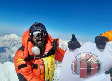 Asad Ali Memon summitting Everest