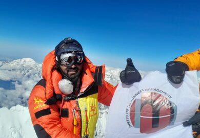 Asad Ali Memon summitting Everest