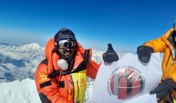 Asad Ali Memon summitting Everest