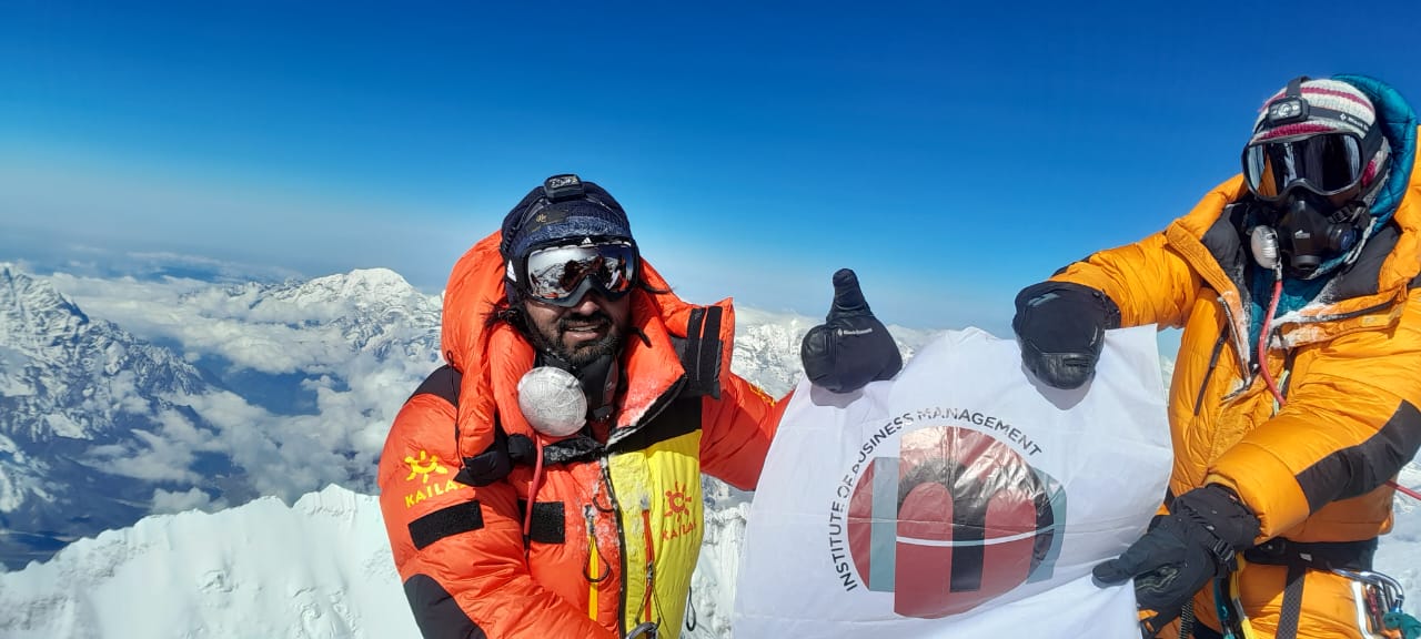 Asad Ali Memon summitting Everest