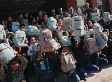 Emirates supports early education with a donation of 107 ‘Aircrafted KIDS by Emirates’ special edition bags in Lahore